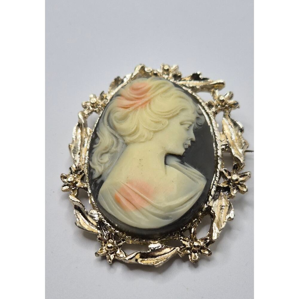 Vintage Cameo Brooch Black Oval Floral Frame Gold Tone